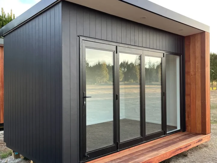 Black cabin with a kwila return and deck
